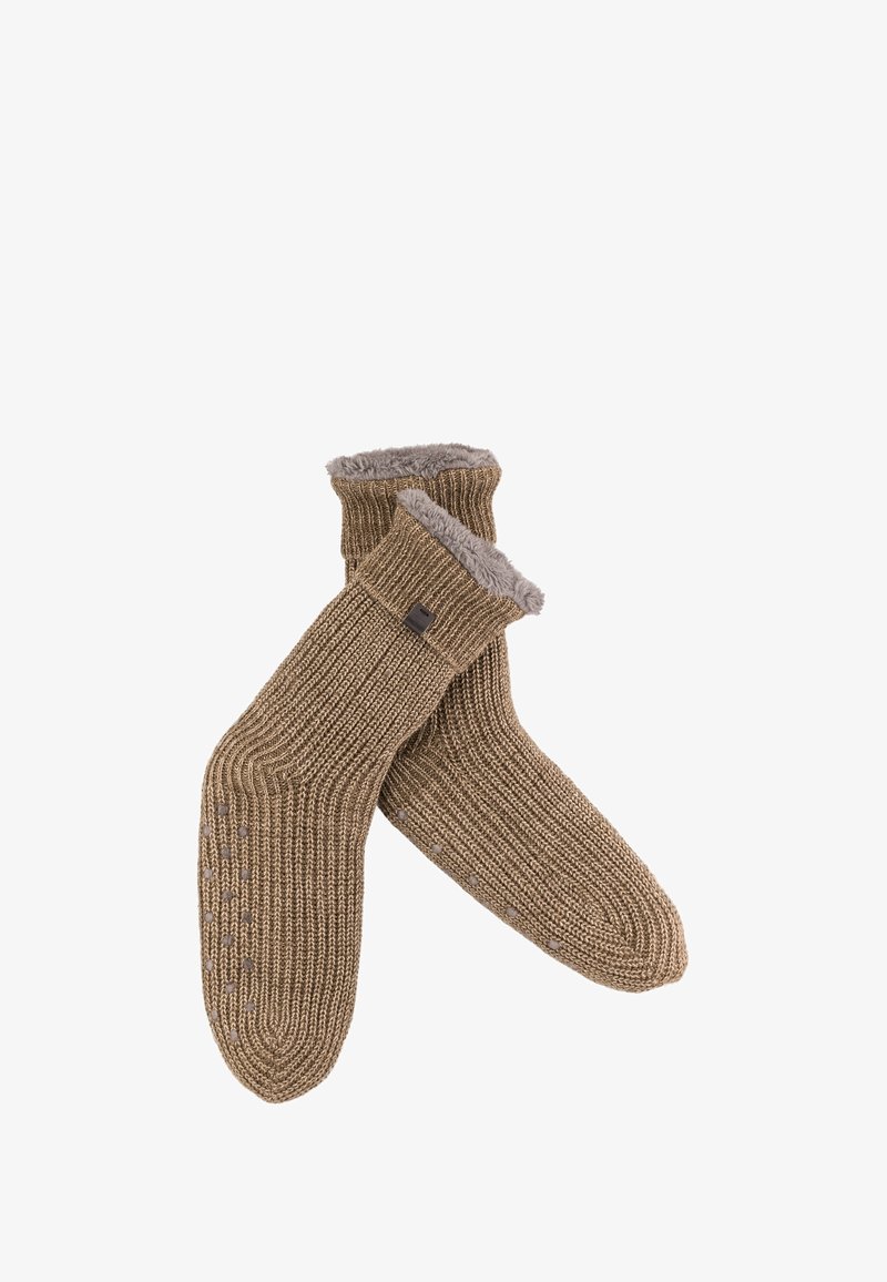 Gebreide sokken van een getextureerd tan materiaal met een zachte grijze fleece voering en een geribbeld ontwerp. Voorzien van antislippunten op de zolen.
