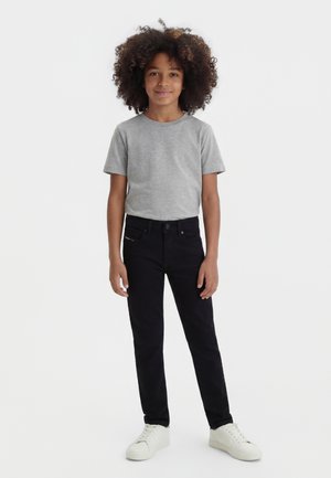 Diesel 1979 SLEENKER-J UNISEX - Jeans Skinny Fit - denim nero