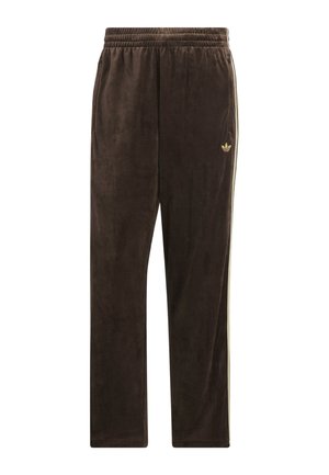 Brown velour track pants with elastic waistband, side stripes, and small Adidas trefoil logo on the left thigh.