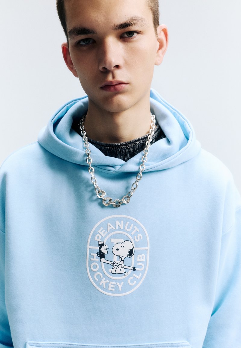 Sweat Peanuts Femme – Bleu – Taille S – Pull Décontracté Avec Logo – État Très Bon
