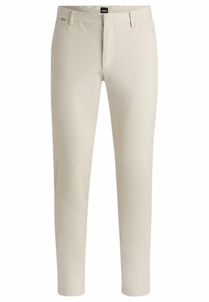 Beige op maat gemaakte broeken van gladde stof, met een ritssluiting aan de voorkant, riemlussen en een slim fit met taps toelopende pijpen.
