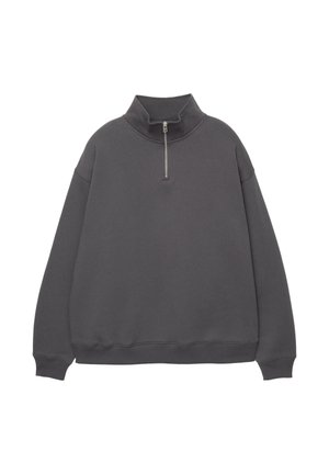 Grijze sweatshirt met rits en hoge kraag, gemaakt van zacht materiaal. Het heeft een ontspannen pasvorm en ribgebreide manchetten en onderkant voor extra textuur.