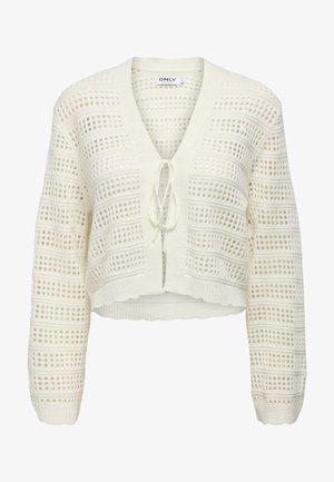 Cardigan en tricot blanc cropped avec un col en V, fermeture par lien et un design ajouré avec des rayures horizontales et verticales, bords texturés.