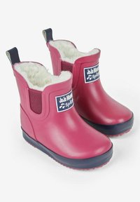 Stivali di gomma impermeabili rosa con fodera in pelliccia sintetica, linguette di presa, inserti laterali elasticizzati e suole con trazione a motivo.