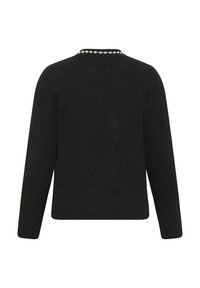 Pull noir avec un col rond, un ourlet côtelé et des manches longues. Présente une bordure décorative blanche le long du col. Texture douce.