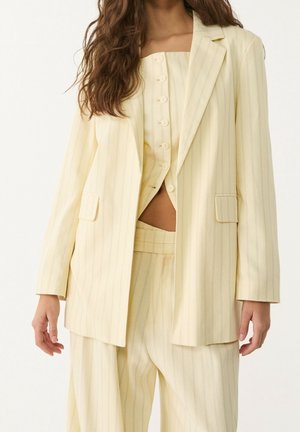 Halflange jas - yellow