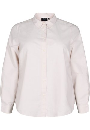 Vaaleanpunainen pitkähihaisuus nappikauluspaita, jossa on klassinen kaulus, suora mallina ja hienovarainen tekstuuri puuvillakankaassa.