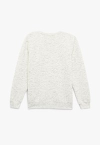 Sudadera color crema claro con un patrón de zigzag texturizado, cuello redondo y mangas largas. Puños y dobladillo acanalados.
