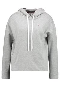 Felpa grigia in misto cotone, con tasca a marsupio, cappuccio con coulisse e logo sul petto. Maniche lunghe con polsini a costine.