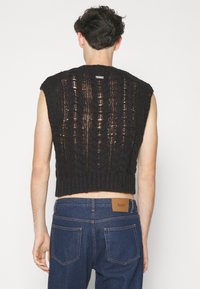 Han Kjøbenhavn Pullover - black