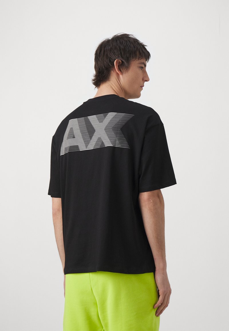 Armani Exchange Schwarzes Damen T Shirt Mit Print Aus Weicher Baumwolle