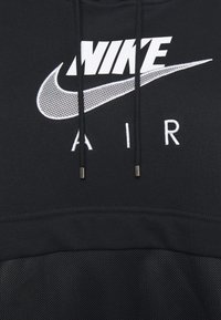 Black sweatshirt featuring a white Nike logo and “AIR” text, with a textured mesh lower section and drawstring accents.