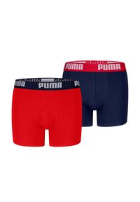 Rote und marineblaue Boxershorts mit elastischem Bund; die rote hat ein weißes Logo, die marineblaue hat einen kontrastierenden dunklen Bund mit weißem Logo.