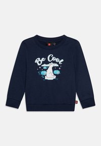 Felpa blu navy con scollo rotondo, caratterizzata da una grafica di un orso polare e testo "Be Cool" in blu chiaro. Polsini e orlo a costine.