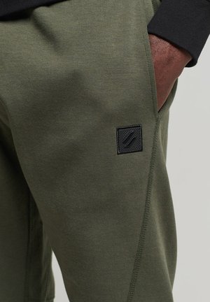 TECH JOGGERS - Pantaloni sportivi - dark moss