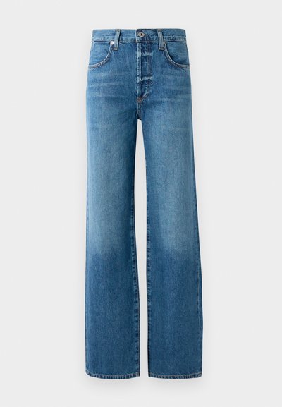 Wide-leg jeans made of light blue denim. Features a button fly, belt loops, and contrasting stitching. The fabric has a faded wash effect.