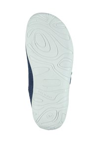 Shoe sole with textured white synthetic material featuring a wave pattern, marked "made in Italy" and size 37, backed by a dark fabric upper.