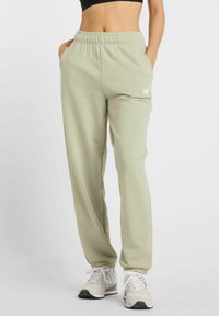 ESSENTIALS FRENCH JOGGER - Tracksuit bottoms - green