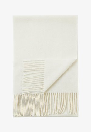 Weiche, off-white Wolldecke mit fransigen Kanten, eine Ecke umgeschlagen, um Struktur und Quasten zu zeigen.