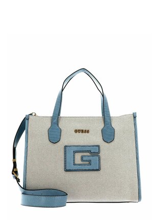 Sac en toile avec des accents bleu clair, au design structuré, lettre en or de la marque, et une bandoulière amovible; dispose de poignées texturées et de détails de logo.