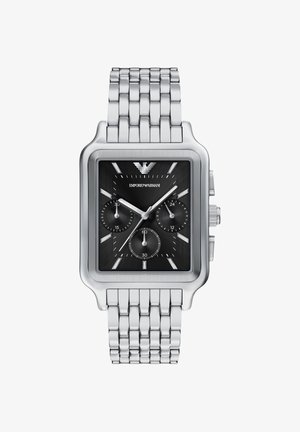 Quadratische Armbanduhr aus Edelstahl mit schwarzem strukturiertem Zifferblatt, silbernen Zeigern, drei Unterzifferblättern und einem silbernen Gliederarmband. Logo oben angebracht.