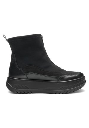 Black ankle boot with thick rubber sole, smooth upper with zipper closure, and pull tab at the back for easy wear.