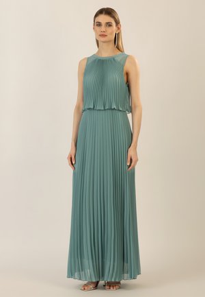 Pleated long dress in teal, featuring a sleeveless design and a flowing silhouette. Smooth fabric provides a soft texture and elegant drape.