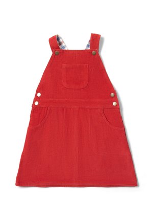 Rotes Corduroy-Trägerskleid mit zwei vorderen Taschen, verstellbaren Trägern und karierter Futter sichtbar am Halsausschnitt. Mit Metall-Druckknöpfen ausgestattet.
