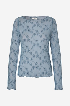 Haut bleu transparent à manches longues avec broderie florale en bleu foncé. Ourlet et poignets festonnés, encolure ronde sans attaches visibles.
