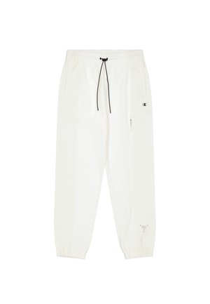 Jogging lightweight blancs avec taille élastique et cordon de serrage. Présente des poignets fuselés et des poches latérales. Décoré avec un logo noir.