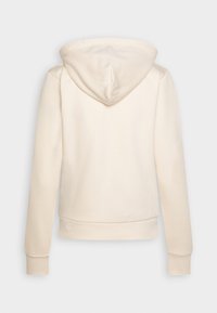Felpa color crema con cappuccio a coulisse, maniche lunghe e polsini e orlo a coste; tessuto morbido, superficie liscia e design semplice.
