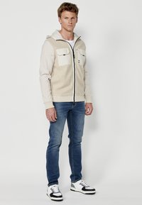 Koroshi Jachetă din fleece - beige