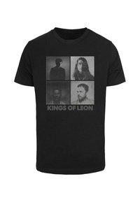 Sort bomulds T-shirt med fire monokromatiske portrætter og teksten "KINGS OF LEON" nedenfor. Korte ærmer og rund halsudskæring.