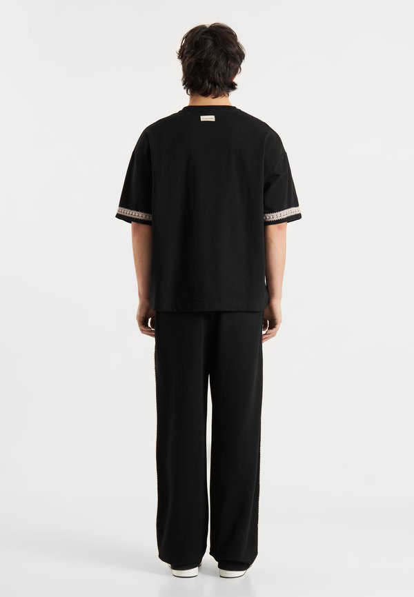 LIRIEL UNISEX - Tracksuit bottoms4