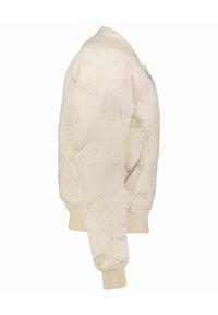 Puffermantel in Cremefarbe, mit gerippten Bündchen und Kragen, gestepptem Muster, seitlichen Taschen und Reißverschluss vorne.