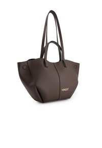 Brown leather handbag with a structured shape, dual handles, and a glossy gold logo. Smooth texture and spacious interior design.