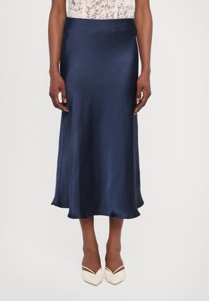 Navy satin slip skirt with a knee-length design, smooth texture, and subtle sheen, featuring a flared hemline and a timeless silhouette.
