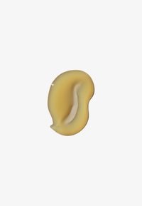 En enkelt glat, buet beige øreform eller høreapparat skal på en ensfarvet hvid baggrund.
