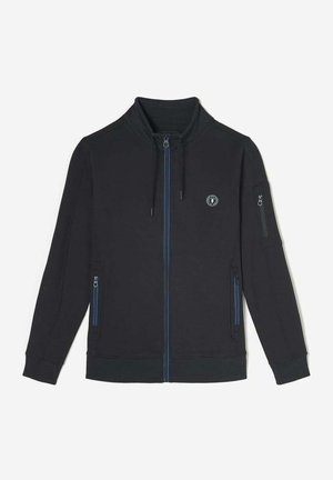 Veste sweatshirt noire avec col montant, accents de fermeture éclair bleus, deux poches avant, poche latérale sur la manche et patch de logo sur la poitrine.