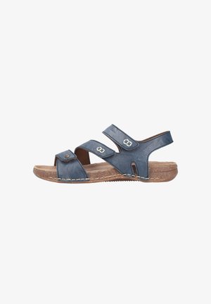 Blue leather sandal featuring two adjustable straps, a cork platform, and stitched detailing. Open toe design with side cutouts for breathability.