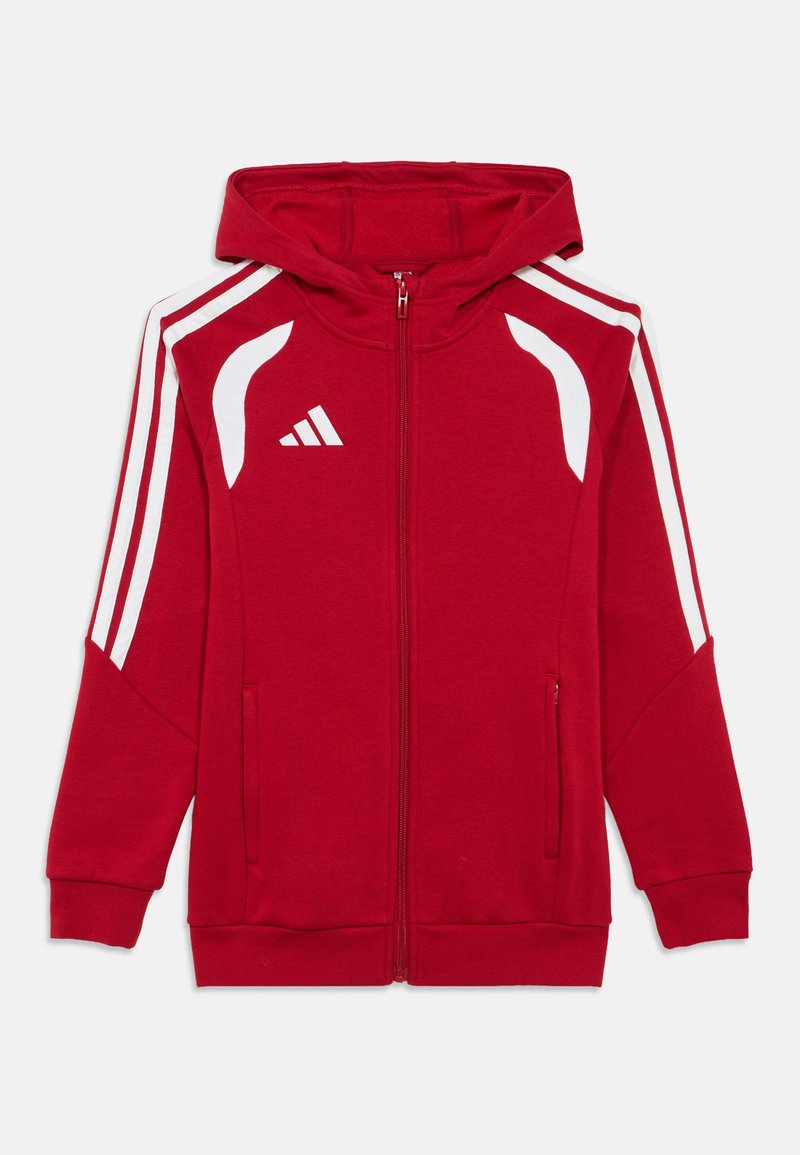 Κόκκινο φούτερ με φερμουάρ, κατασκευασμένο από μαλακό υλικό, με λευκές ρίγες στα μανίκια, τσέπες καγκουρό και κουκούλα. Λογότυπο Adidas στο στήθος.