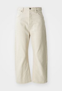 Beige vidjeans laget av bomullsdenim, med høy midje, fem lommer og en subtil falmet struktur. Messingknapp-lukking.
