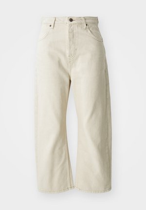 Beige wijde spijkerbroek van katoen-denim, met een hoge taille, vijf zakken en een subtiele vervaagde structuur. Messing knoopsluiting.