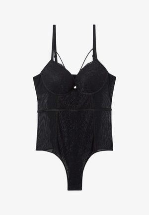 Body nero in pizzo e tessuto trasparente. Presenta coppe imbottite, spalline regolabili e una vita aderente. Design con fondo aperto.