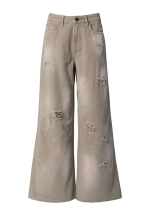 Beige wide-leg jeans with distressed details and subtle speckled pattern, featuring front pockets and belt loops.