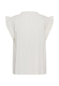 Blouse blanche à manches courtes avec petits points texturés et bords de manches volantés, vue de dos sur fond blanc.