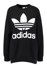 Svart sweatshirt i bomullsblandning, med en stor vit Adidas-logga och tre horisontella ränder på bröstet. Rund hals och ribbade ärmslut.