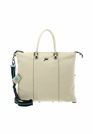 Sac fourre-tout en cuir beige avec deux anses, une bandoulière réglable noire et bleu sarcelle, et une petite pochette attachée sur fond blanc.