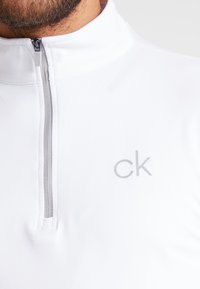 Calvin Klein Golf NEWPORT HALF ZIP - Tops ar garām piedurknēm - white