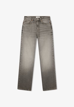 Jeans grigi ampi con un design sbiadito, dotati di cinque tasche e chiusura con bottone. Tessuto denim testurizzato con leggere variazioni di colore.